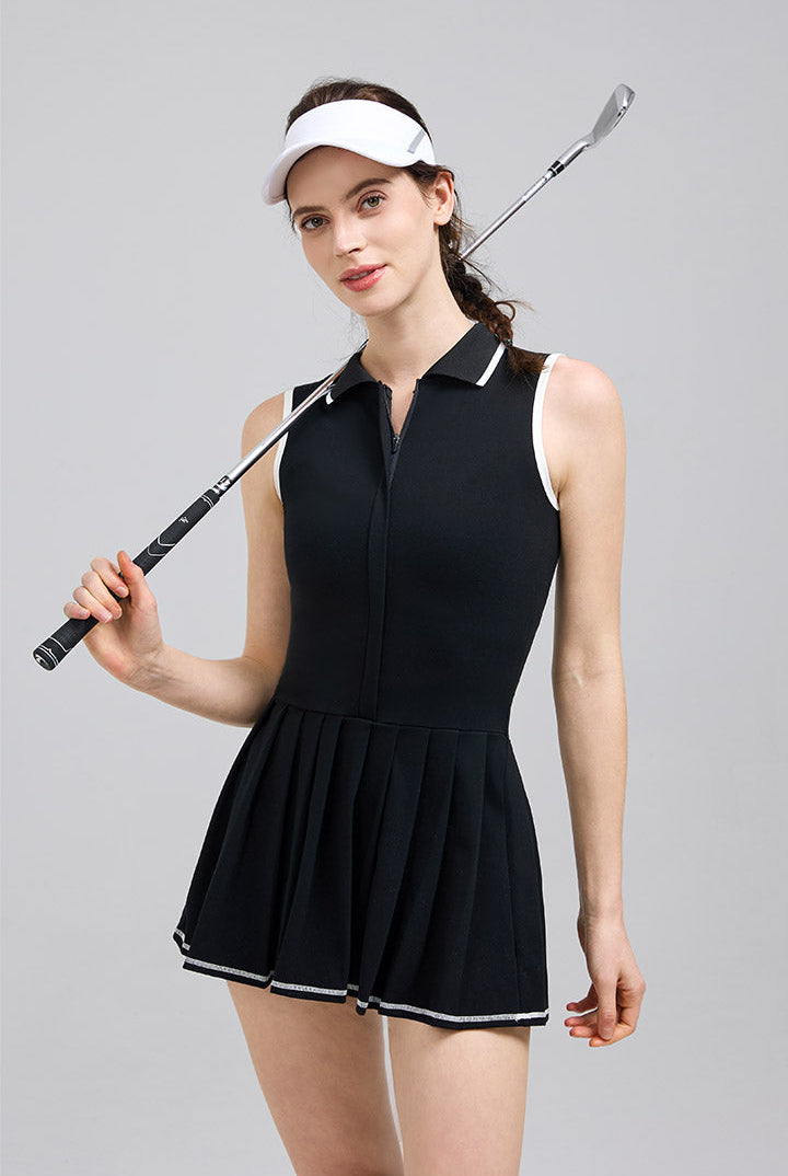 Woman wearing a SALTUM women's tennis dress for court and everyday wear