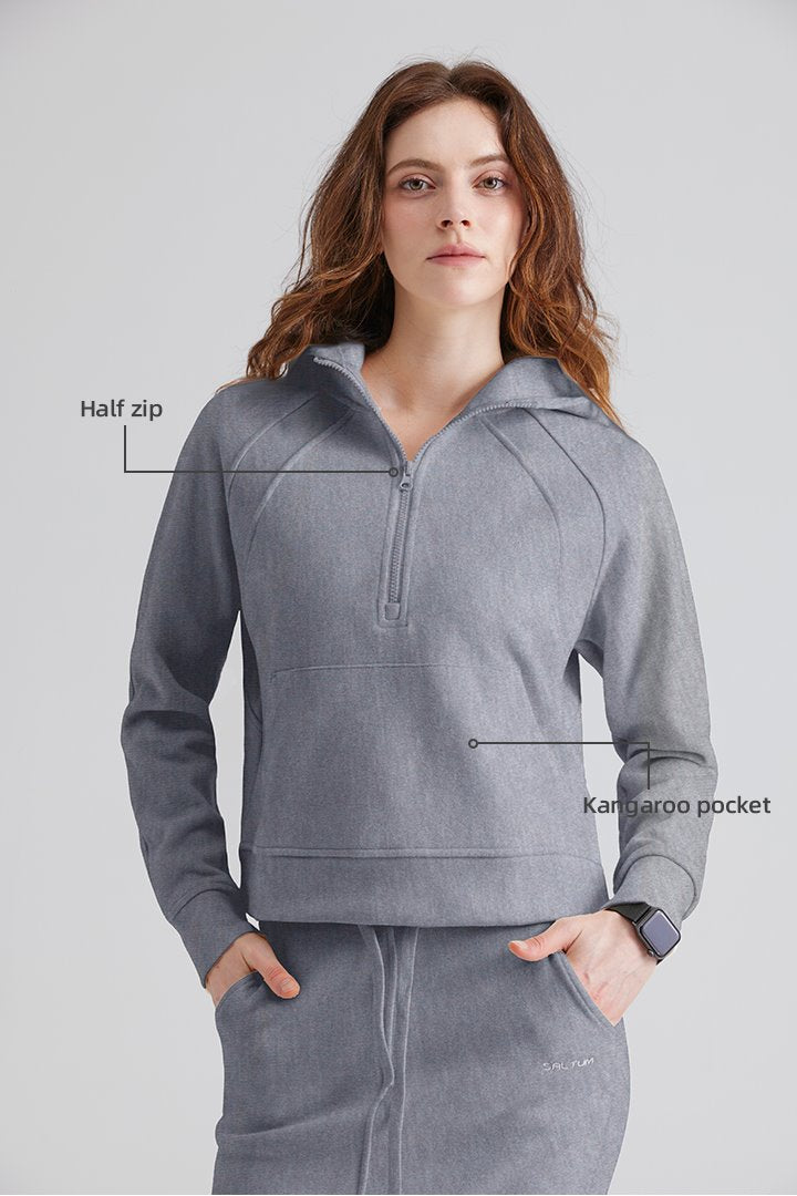 Person gray half-zip hoodie with kangaroo pocket