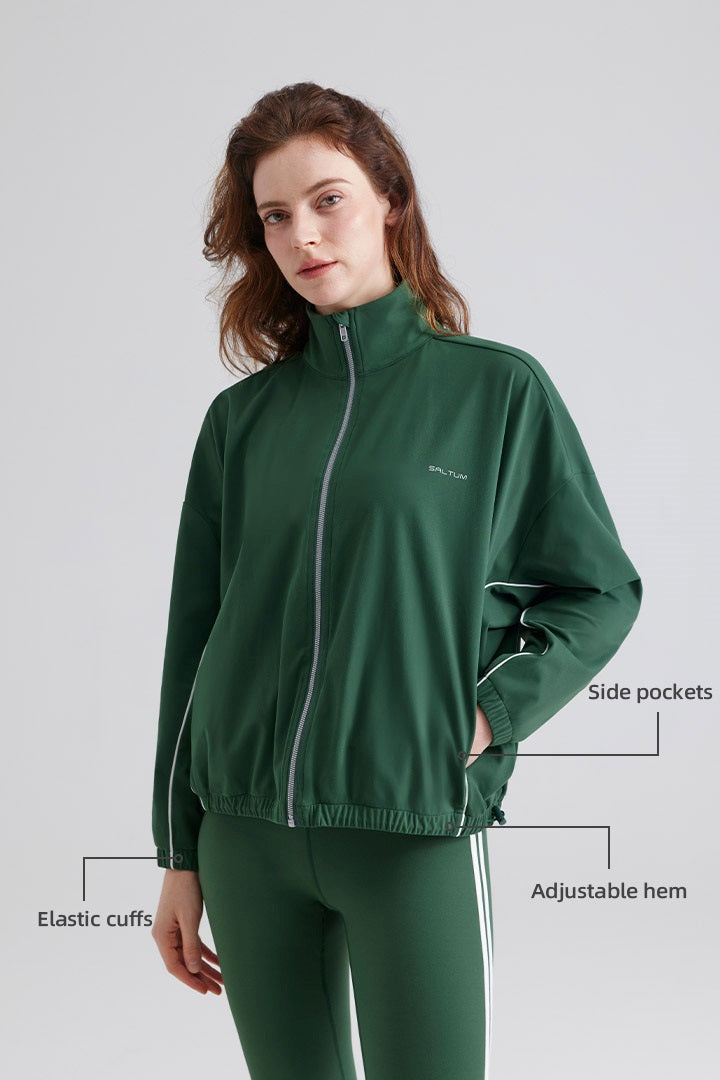 Woman green tracksuit jackets and leggings
