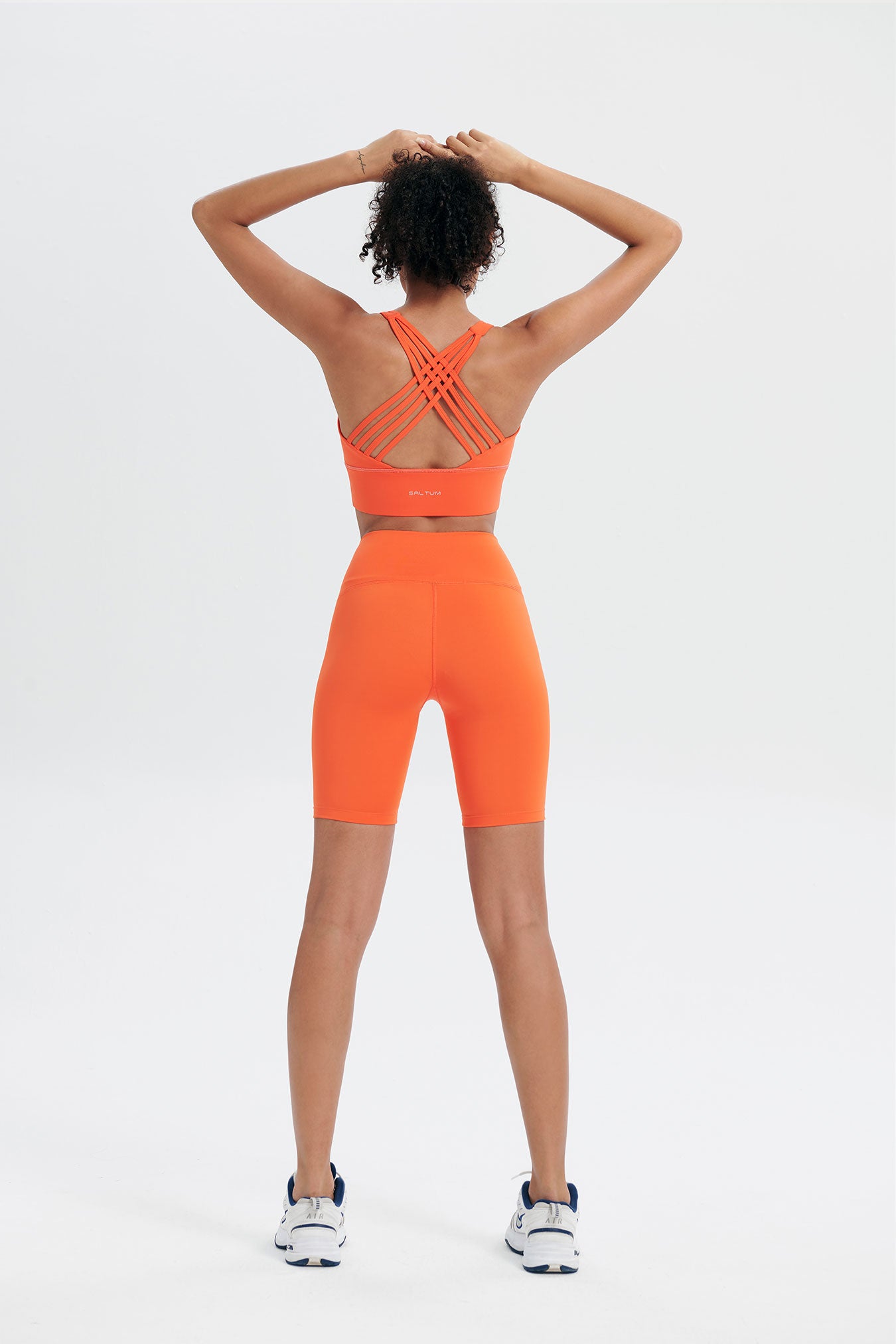 ladies orange sports outfit for tennis yoga
