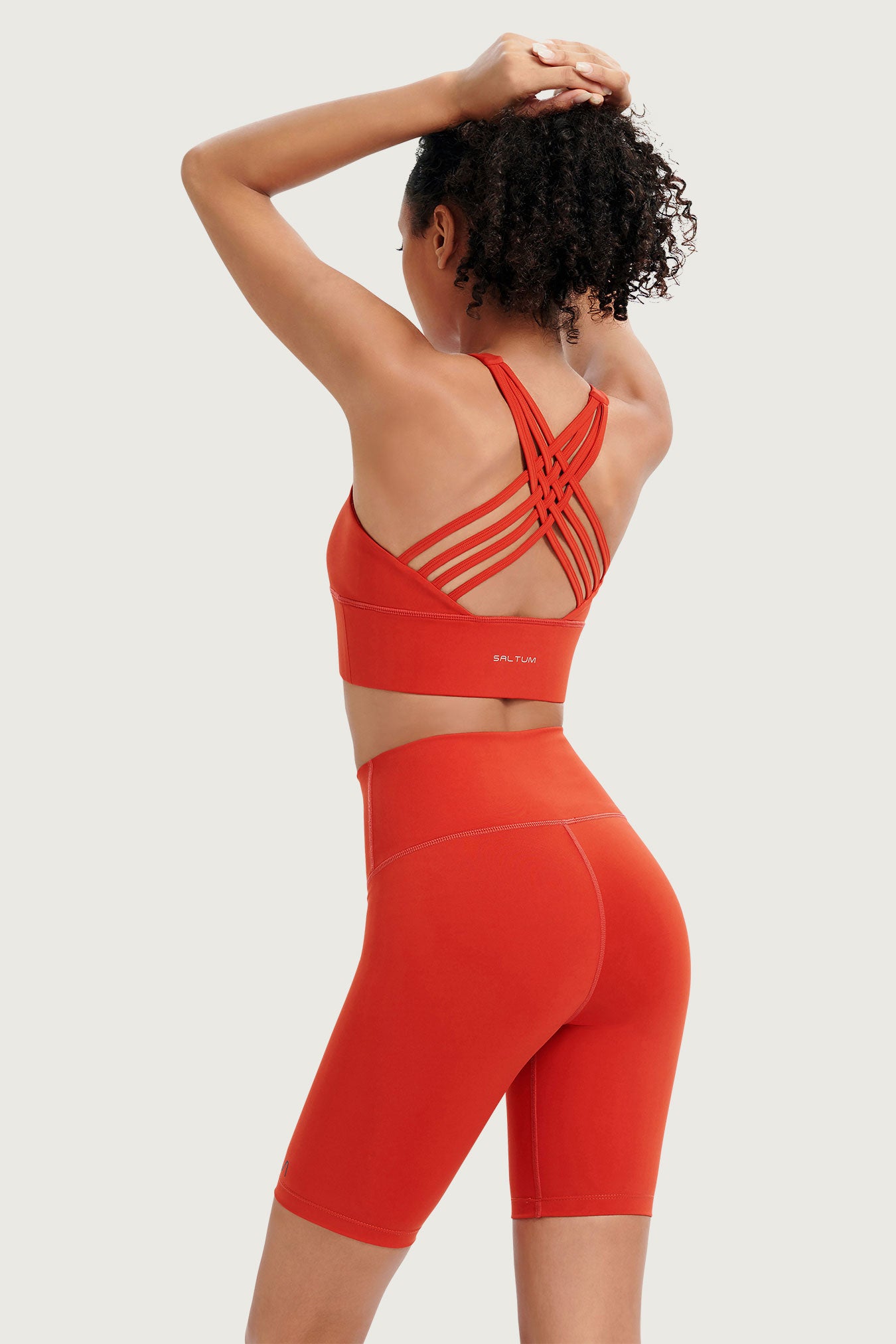 red sports bra and Yoga Shorts