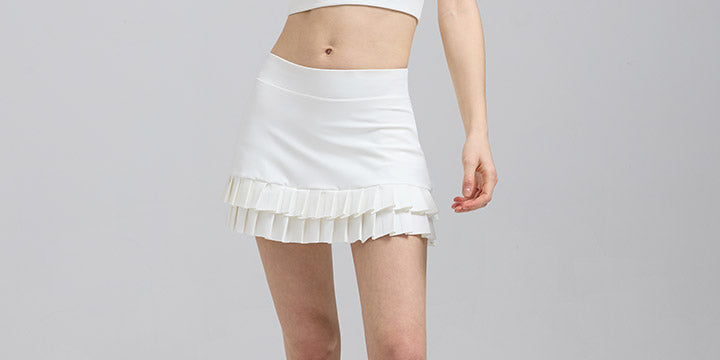 Saltum Sports Criss Cross Sports Bra and Double Pleated Mini Skirt Set white