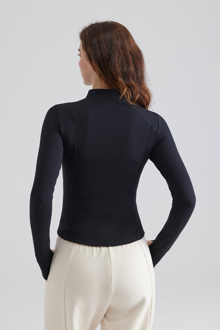 Women Athletic black long-sleeve top and white pants