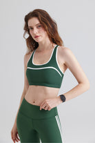 Woman green sports Racerback bra and leggings