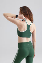 Woman green racerback sports bra and leggings Sets