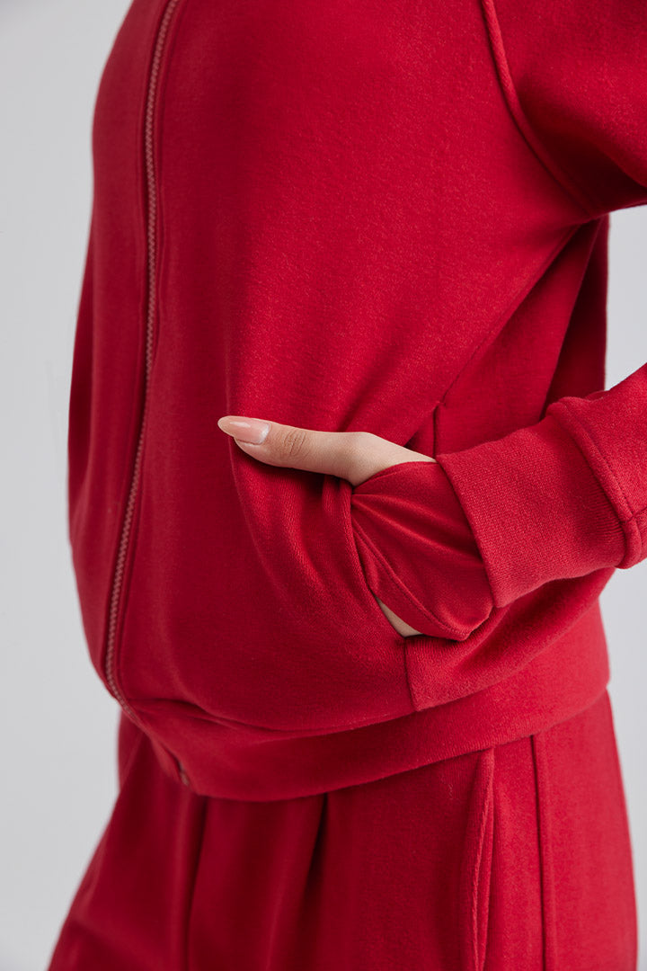 Casual Loose Warm Sweatshirt outfit with a close-up of a hand in a pocket