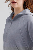 Close-up women gray zip-up hoodie 