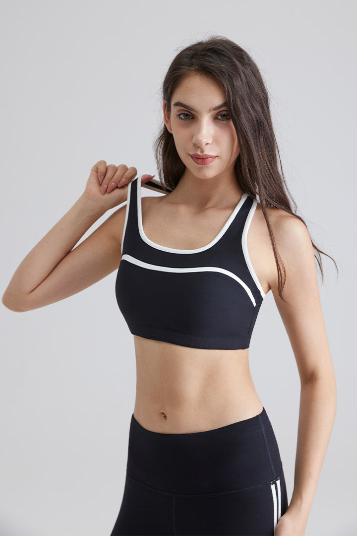 Woman black sports yoga top bra and leggings 