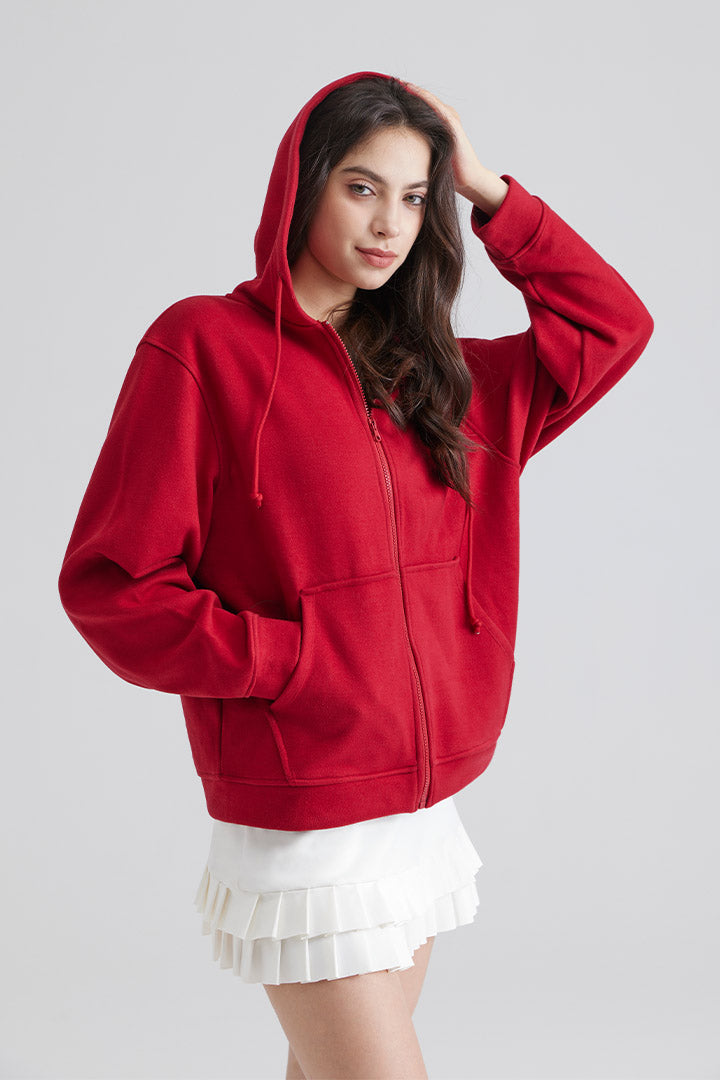 Woman Zip-Up Hoodie with Drawstring and cap and white skirt 