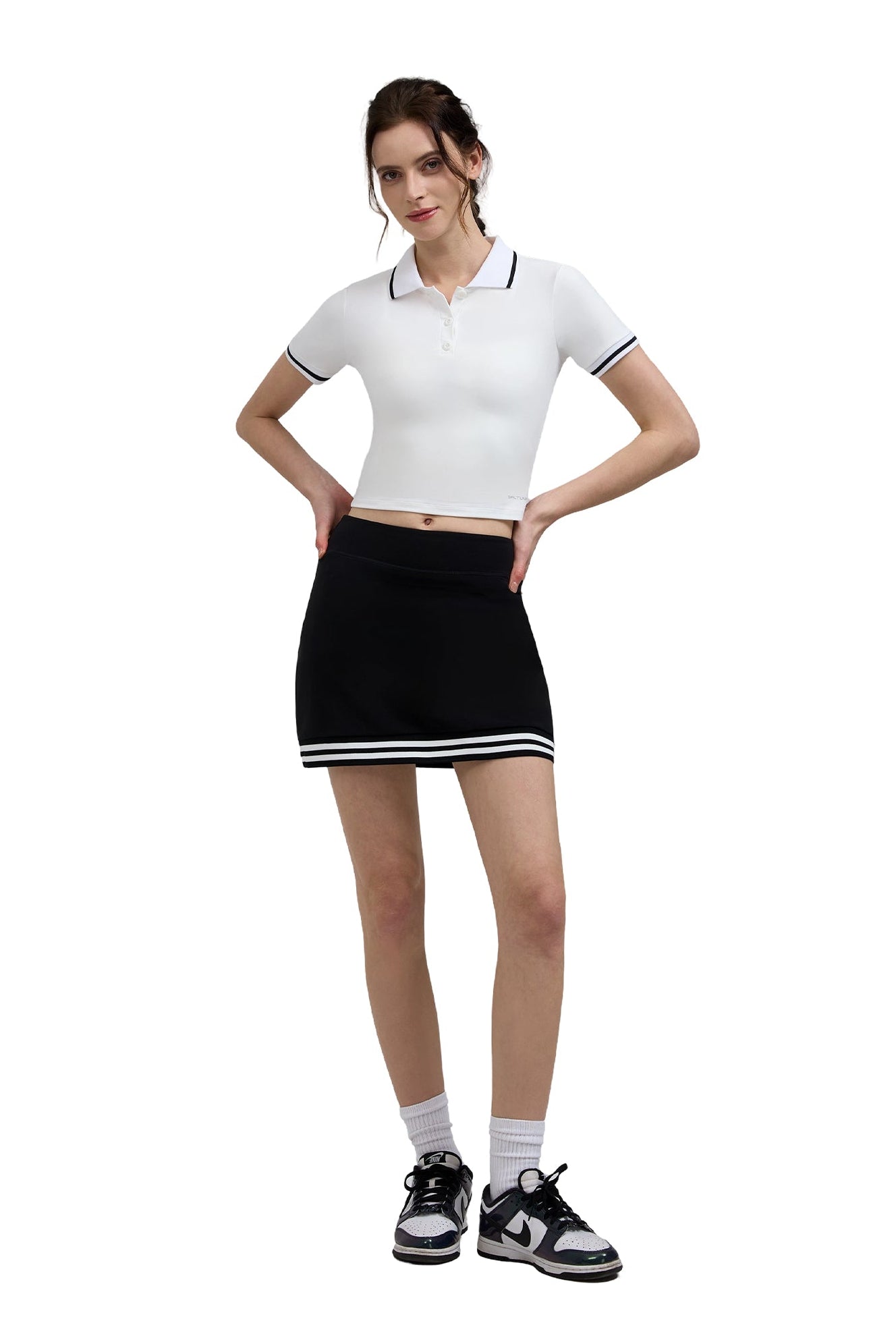Woman white polo shirt and black skirt Golf Skort 