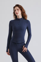 Woman blue long-sleeve 1/4 Zip Turtleneck Sports Tee With Pocket top and pants 