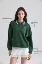Woman green polo shirt and Tennis Dress