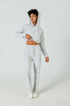 Person wearing CloudFleece™ Wide Leg Sweatpant in light flecked grey with adjustable waistband and deep side pockets for casual comfort.