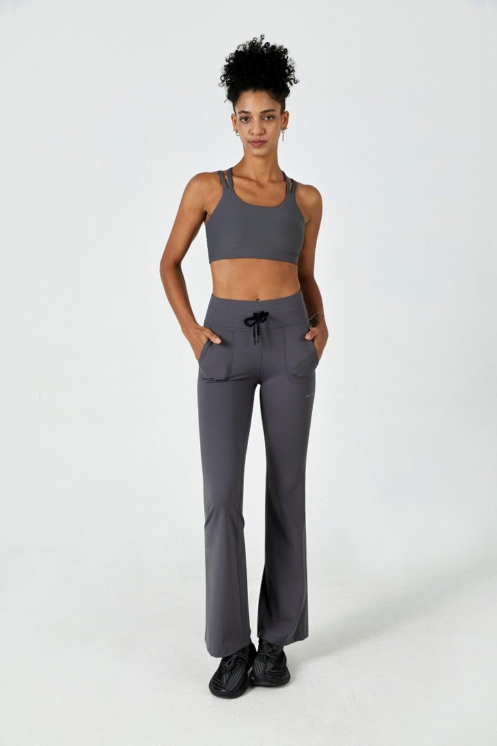 SALTUM grey sports bra and flare legging set for a low-impact studio workout